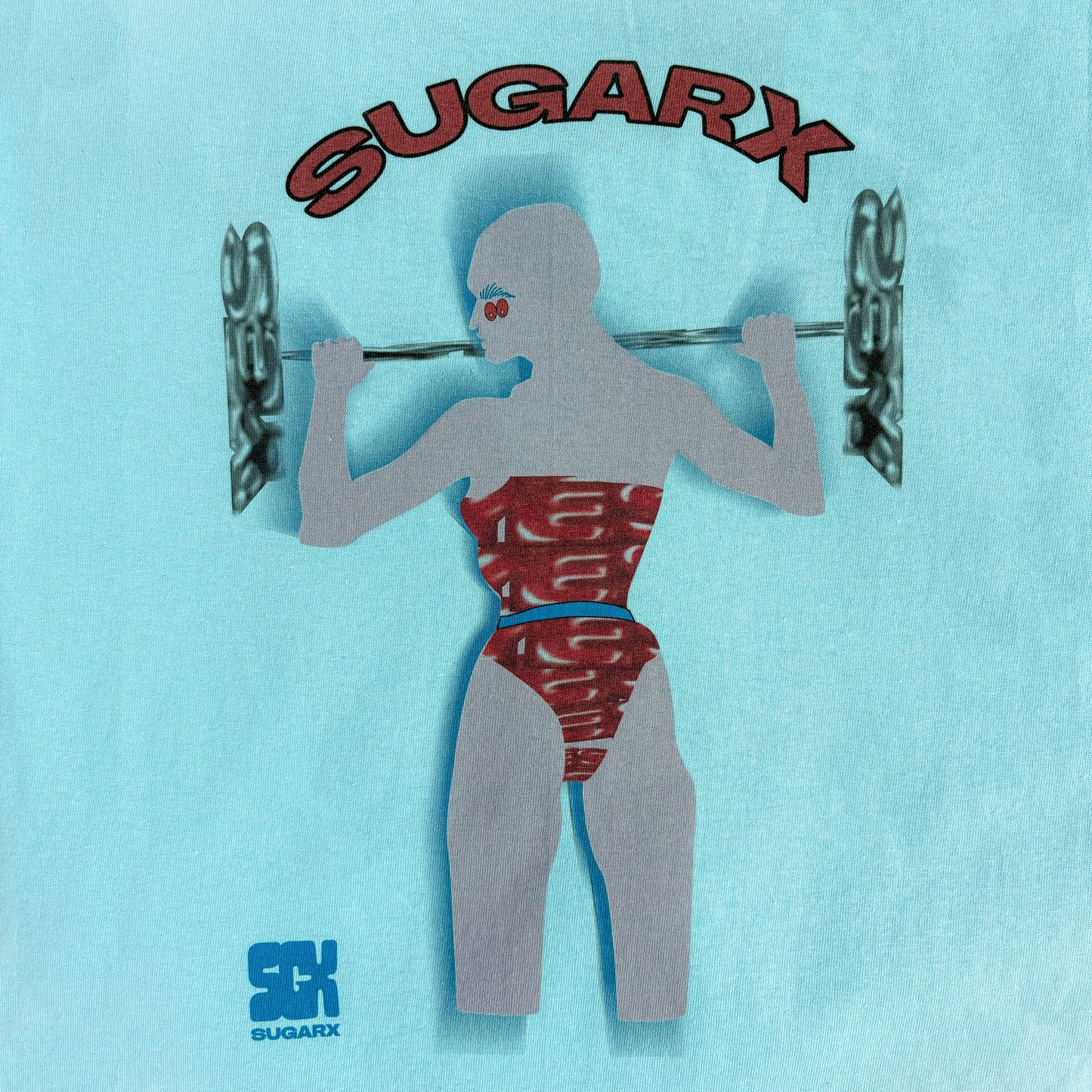 ブルーのTシャツ、背面のSUGARXロゴと女性フィギュアプリント