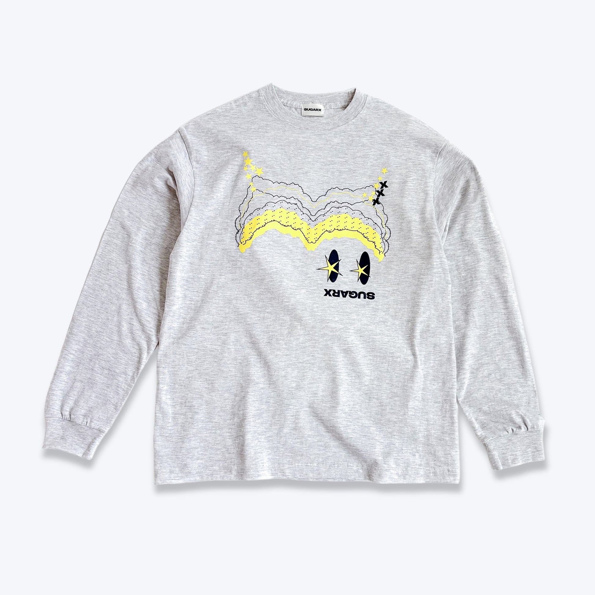 グレーの長袖Tシャツ、フロントにイラストと星モチーフのプリント